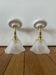 Pair of wall sconces with vintage globes