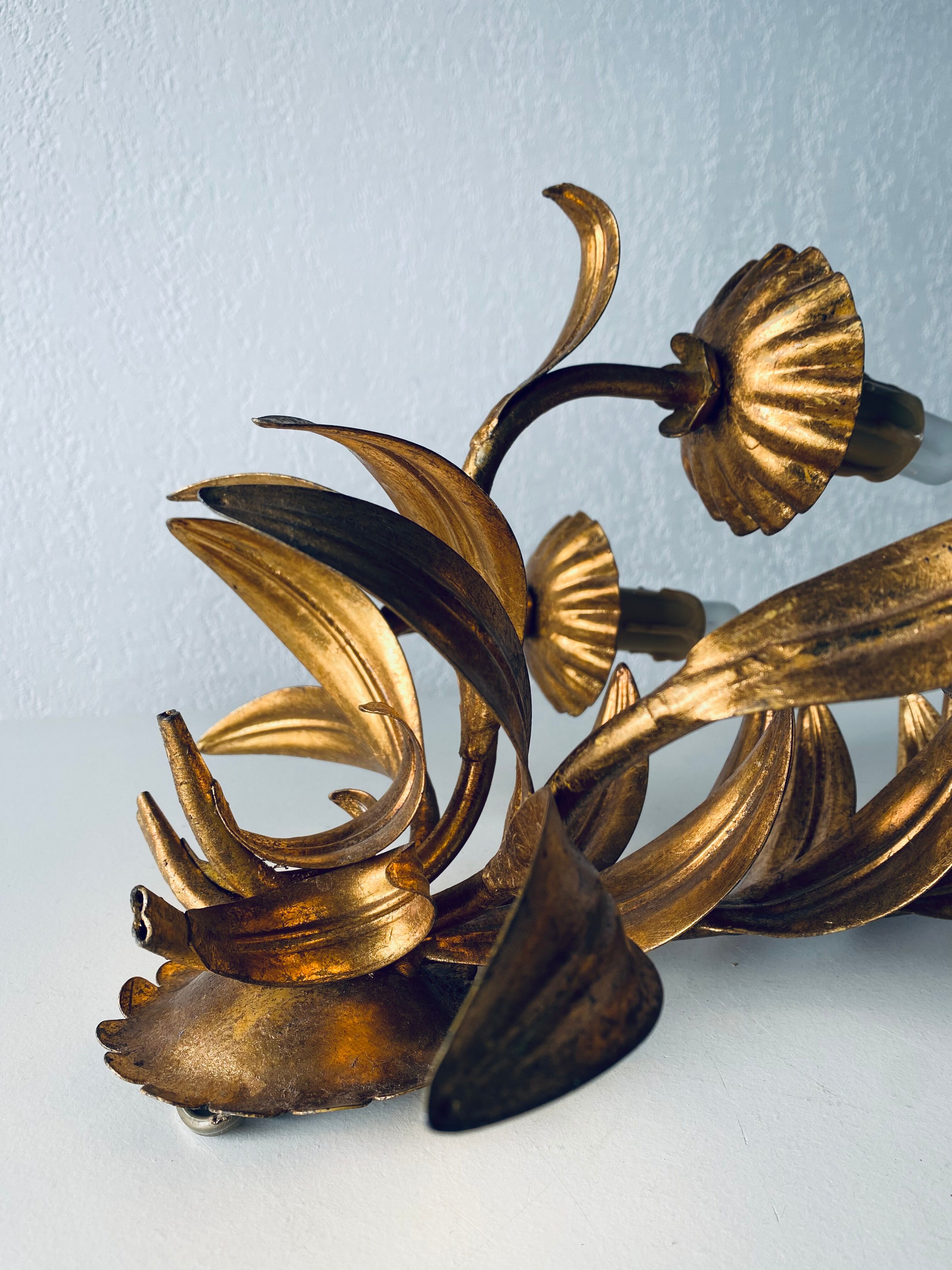 Golden leaf wall light