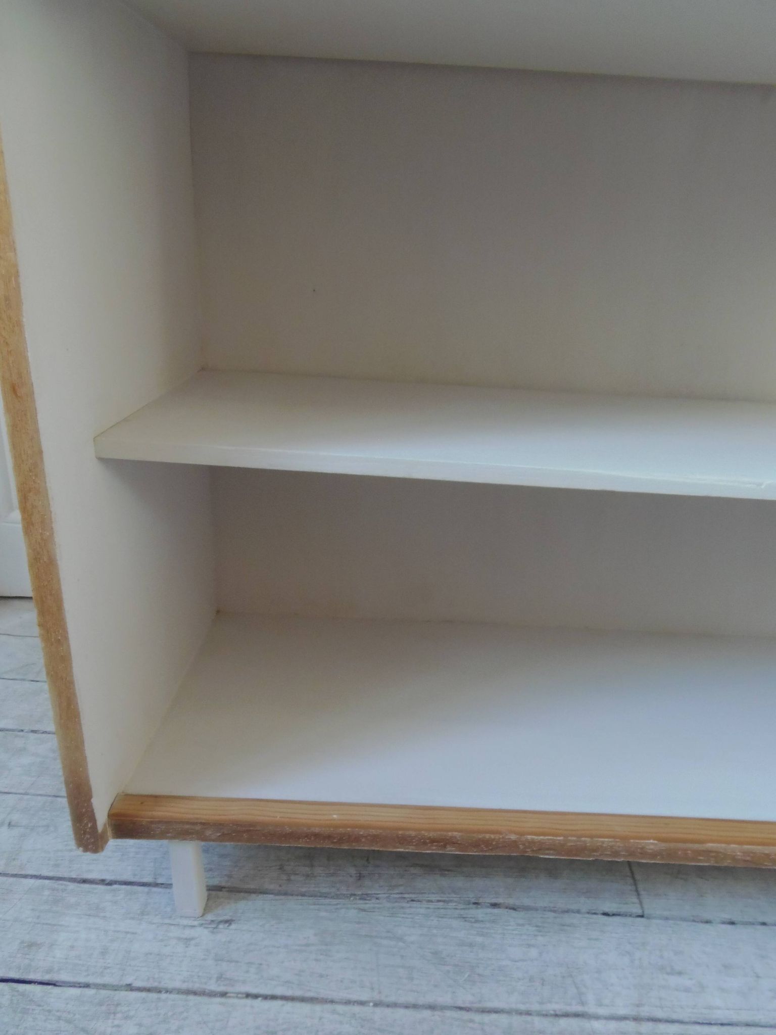 Vintage library in oak veneer, pearl grey interior, metal legs.