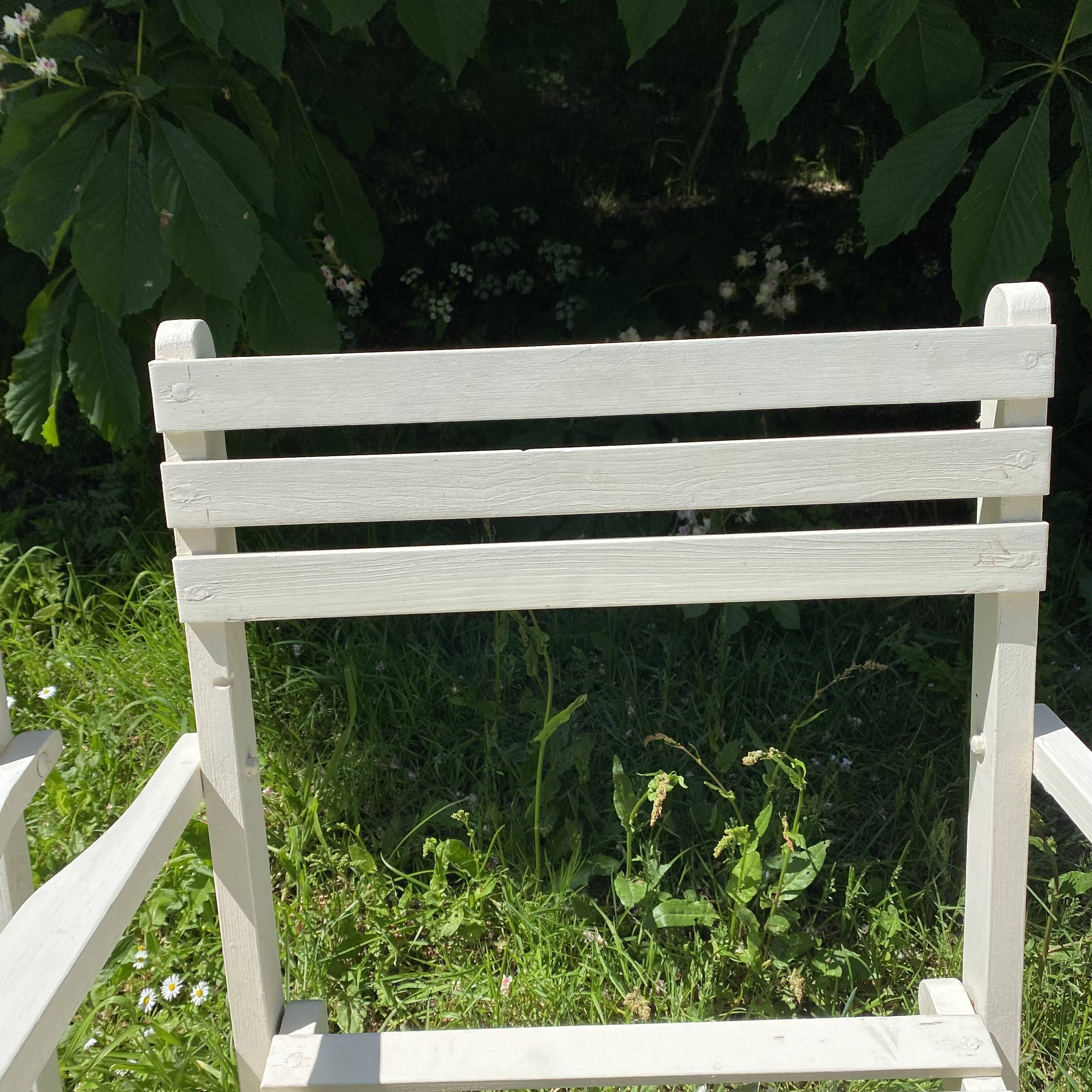 Folding slatted garden armchairs