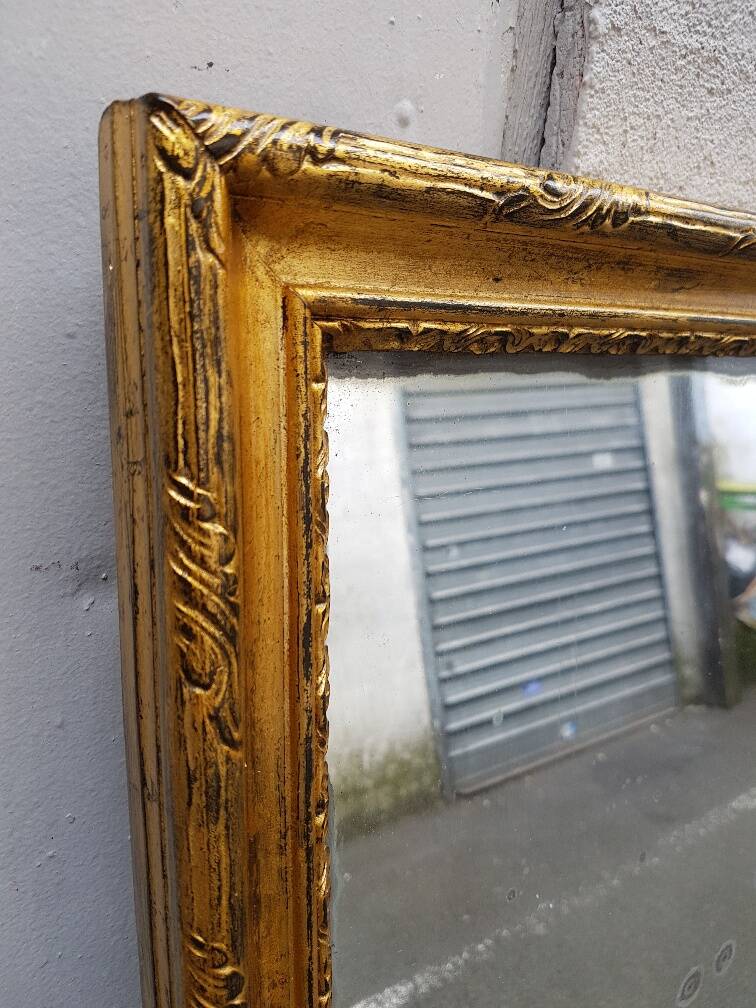 Carved wooden mirror gilded from the louis xv period