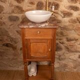 Washbasin made from a bedside table.