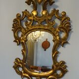 Miroir XIXème en bois sculpté doré 46 x 93 cm