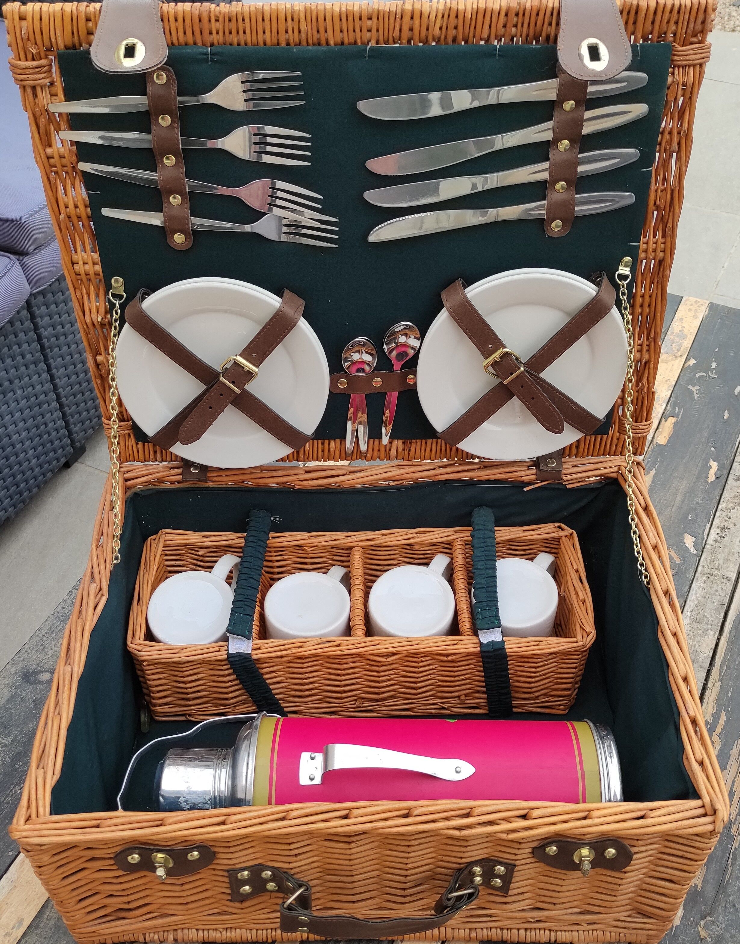 Picnic basket with white porcelain crockery