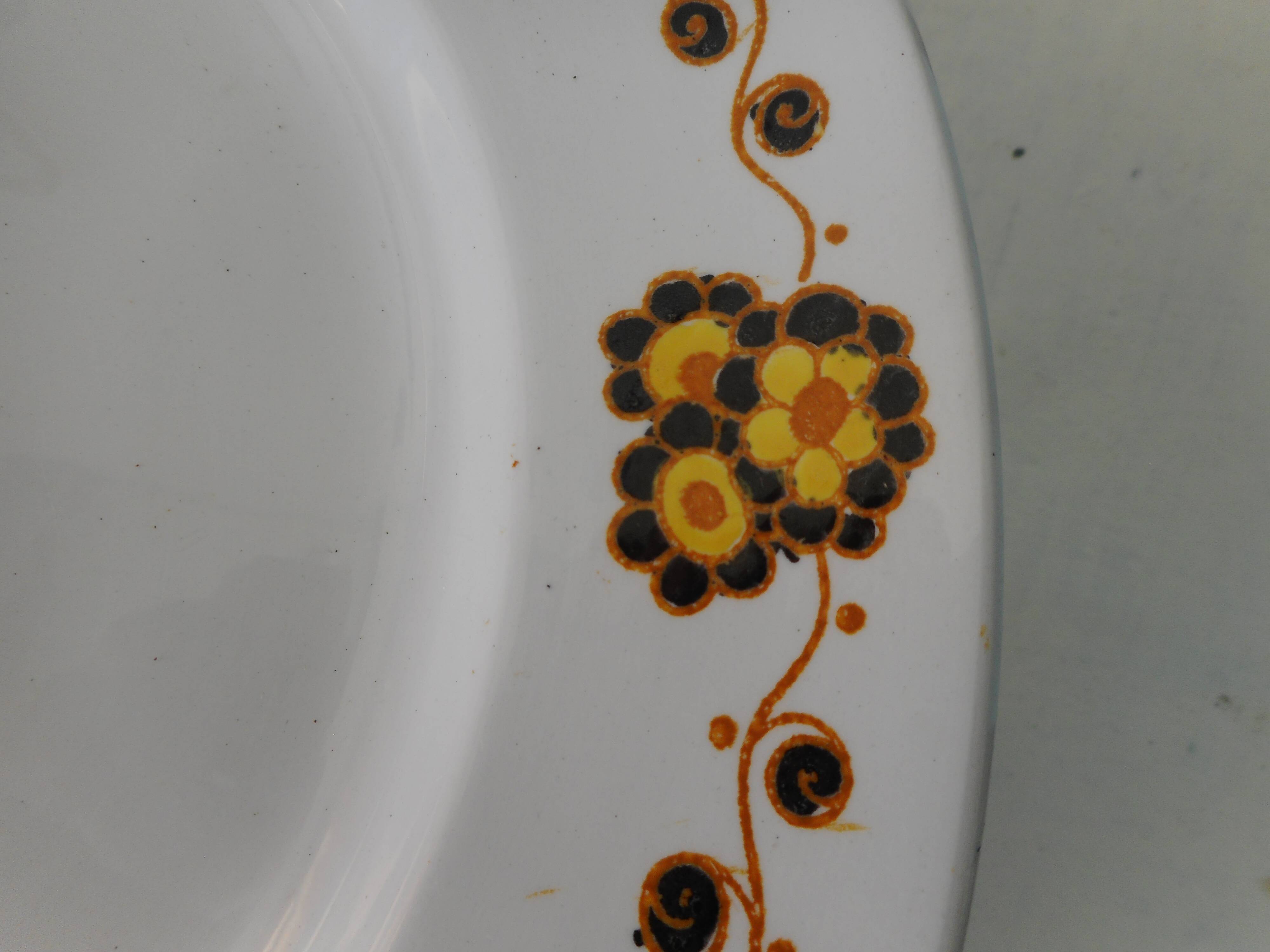 Set of 8 flat plates in Boch earthenware