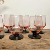 6 small pink glasses with black stem