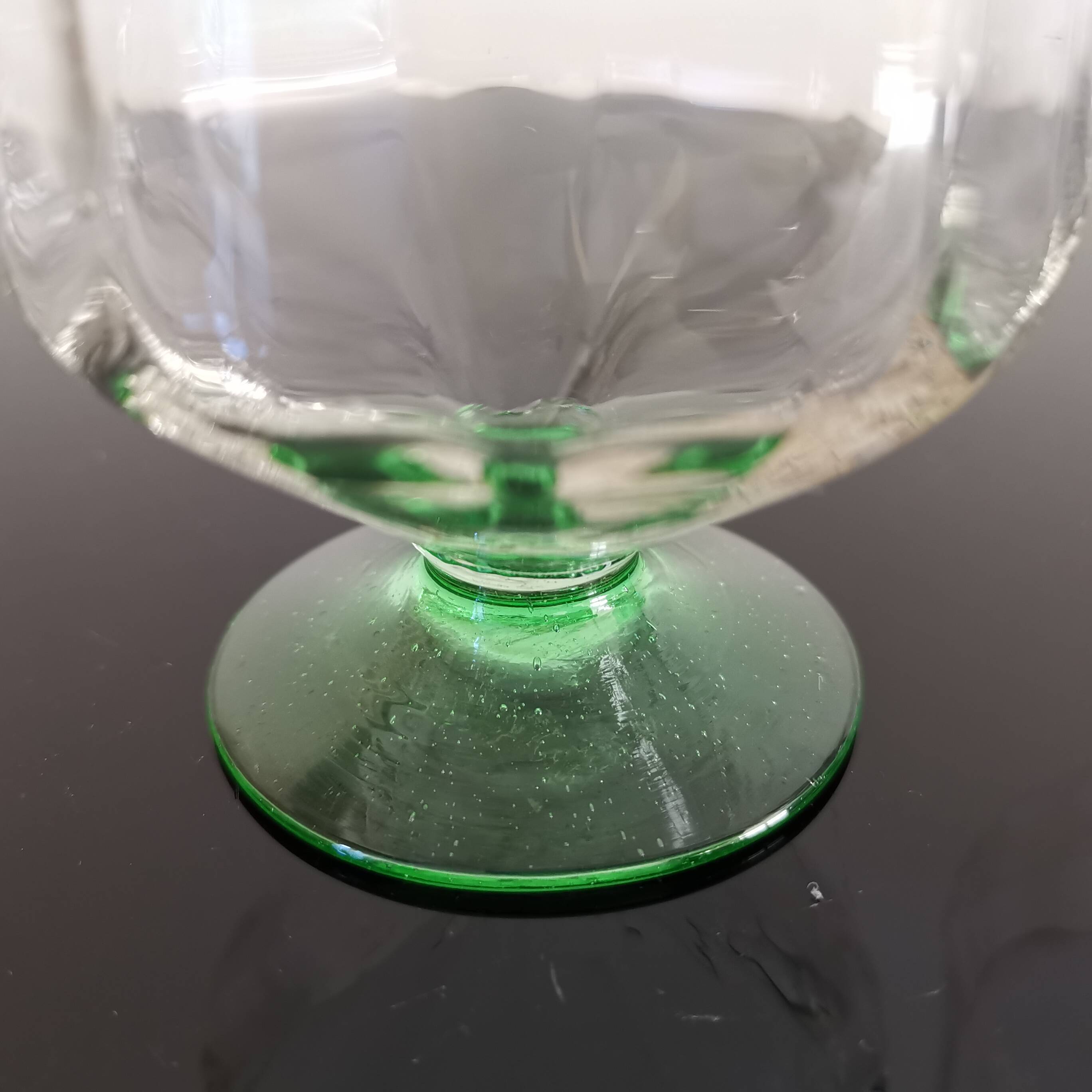 2 faceted champagne glasses with green feet, 1930s