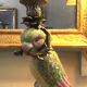 Pair of porcelain candlesticks with parrots and bronze mounts.