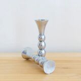 Pair of vintage cast aluminum candle holders