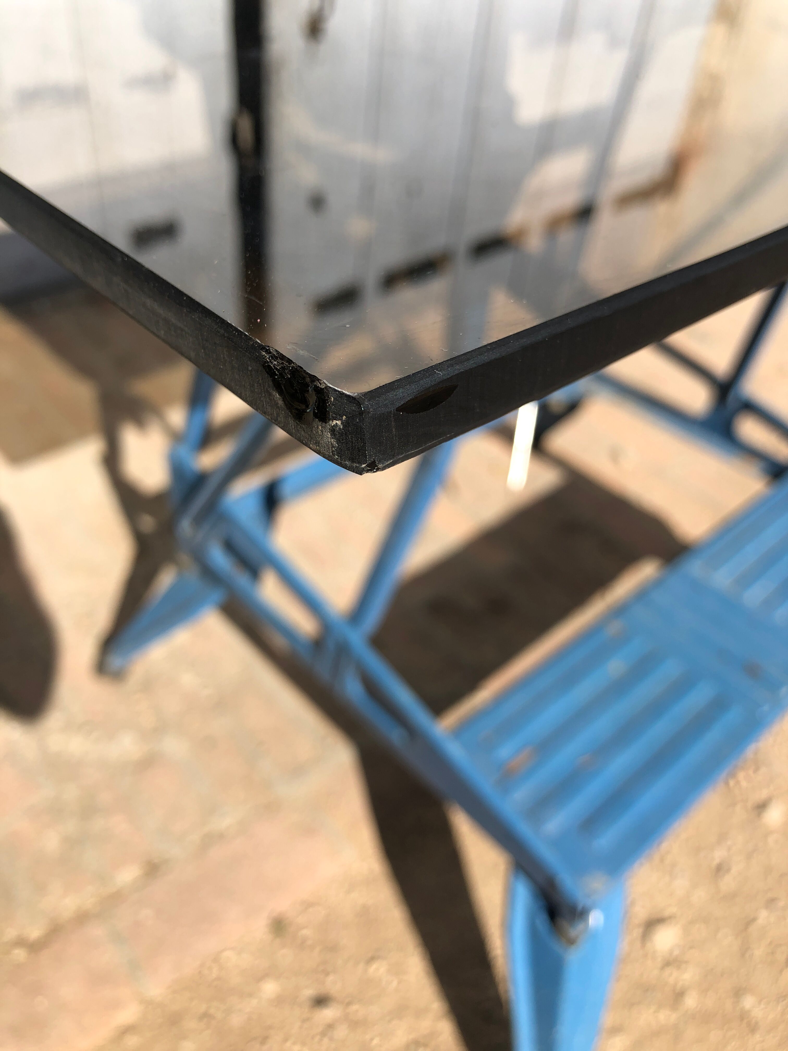 Glass and chrome metal dining table