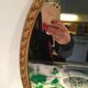 Bevelled golden oval mirror 40x51cm