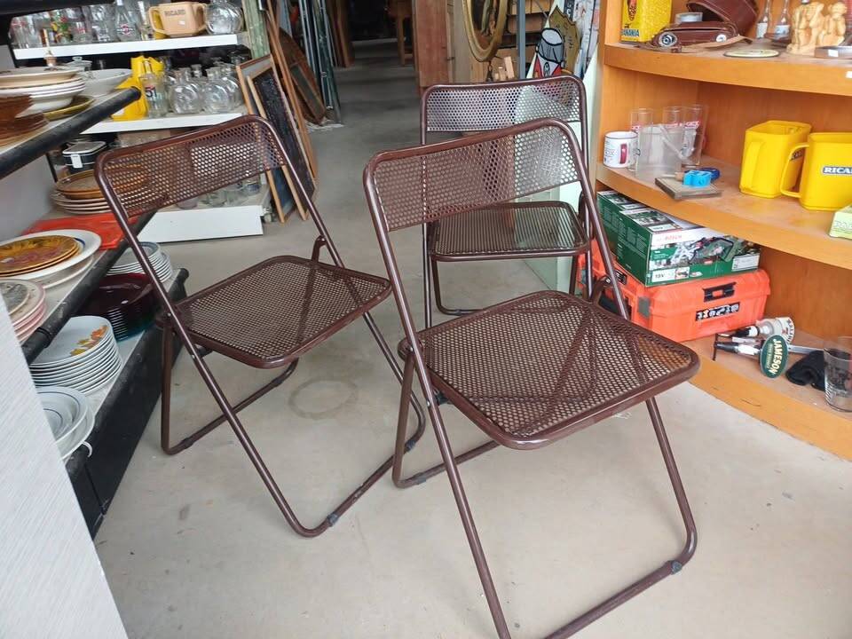 vintage perforated metal folding chair –