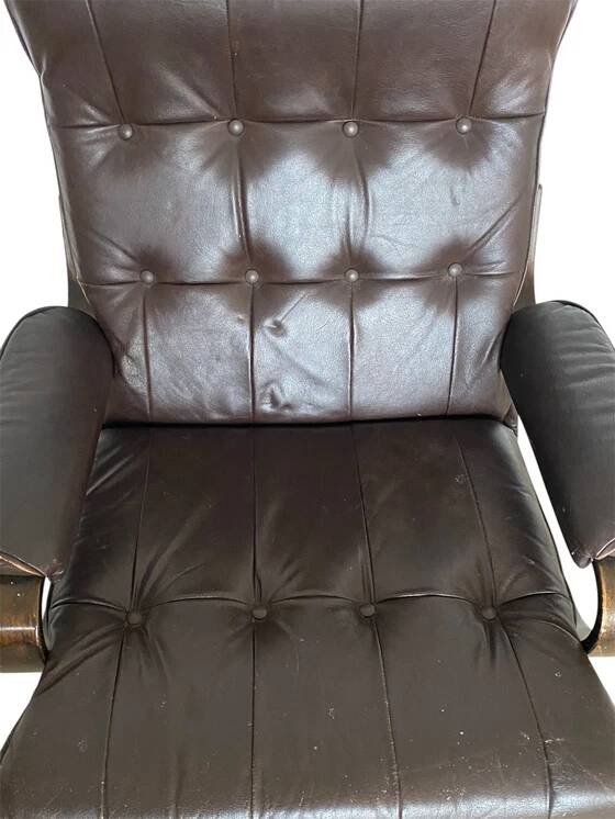 Vintage Scandinavian armchair in curved wood and leather