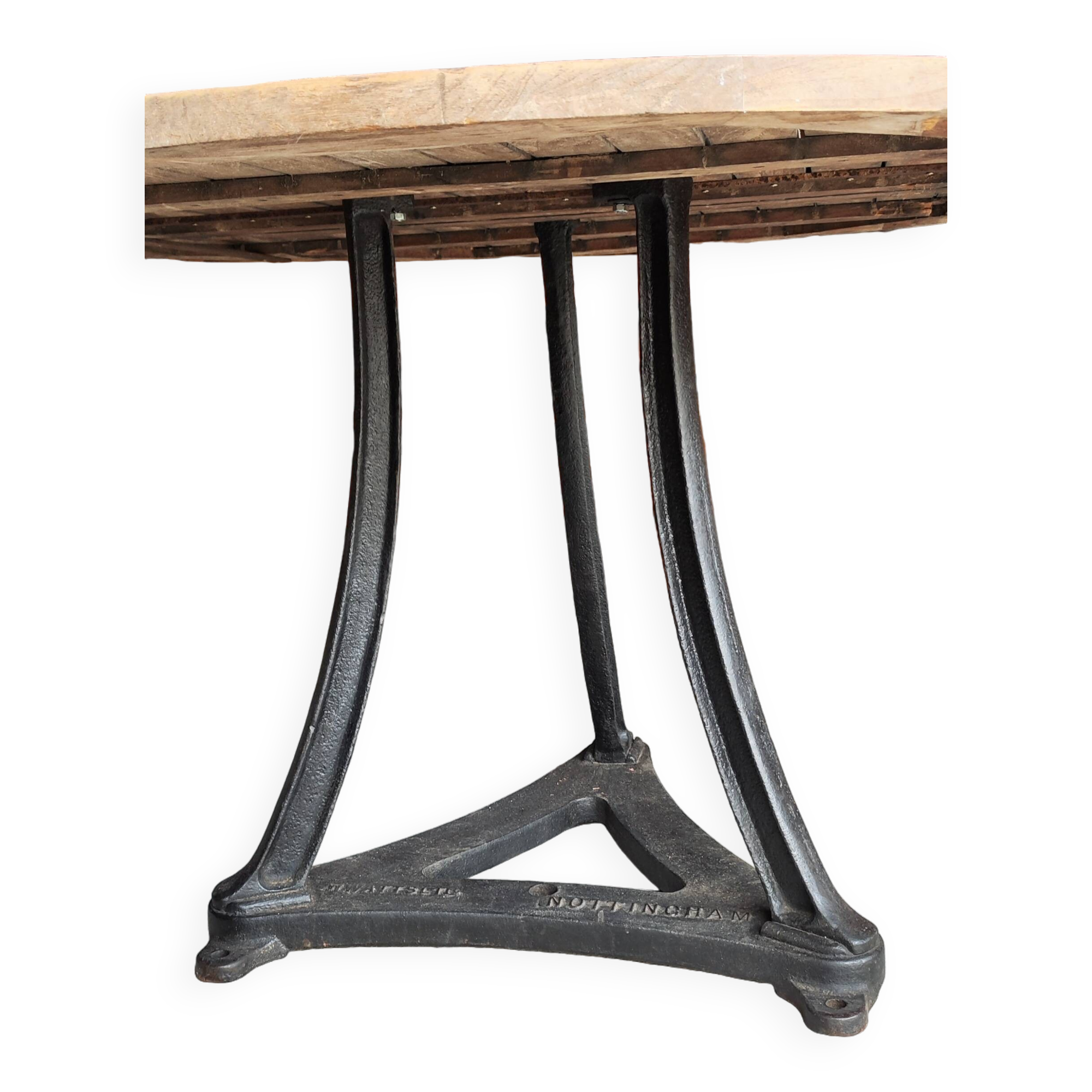 Industrial table with cast iron legs and teak top