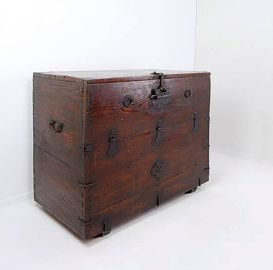 Asian wooden chest with decorative fittings
