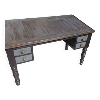 Desk with aged patina slope