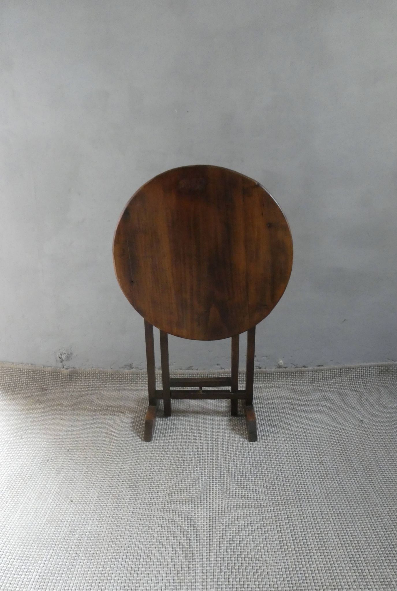 Small table known as a winemaker's table.