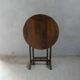 Small table known as a winemaker's table.