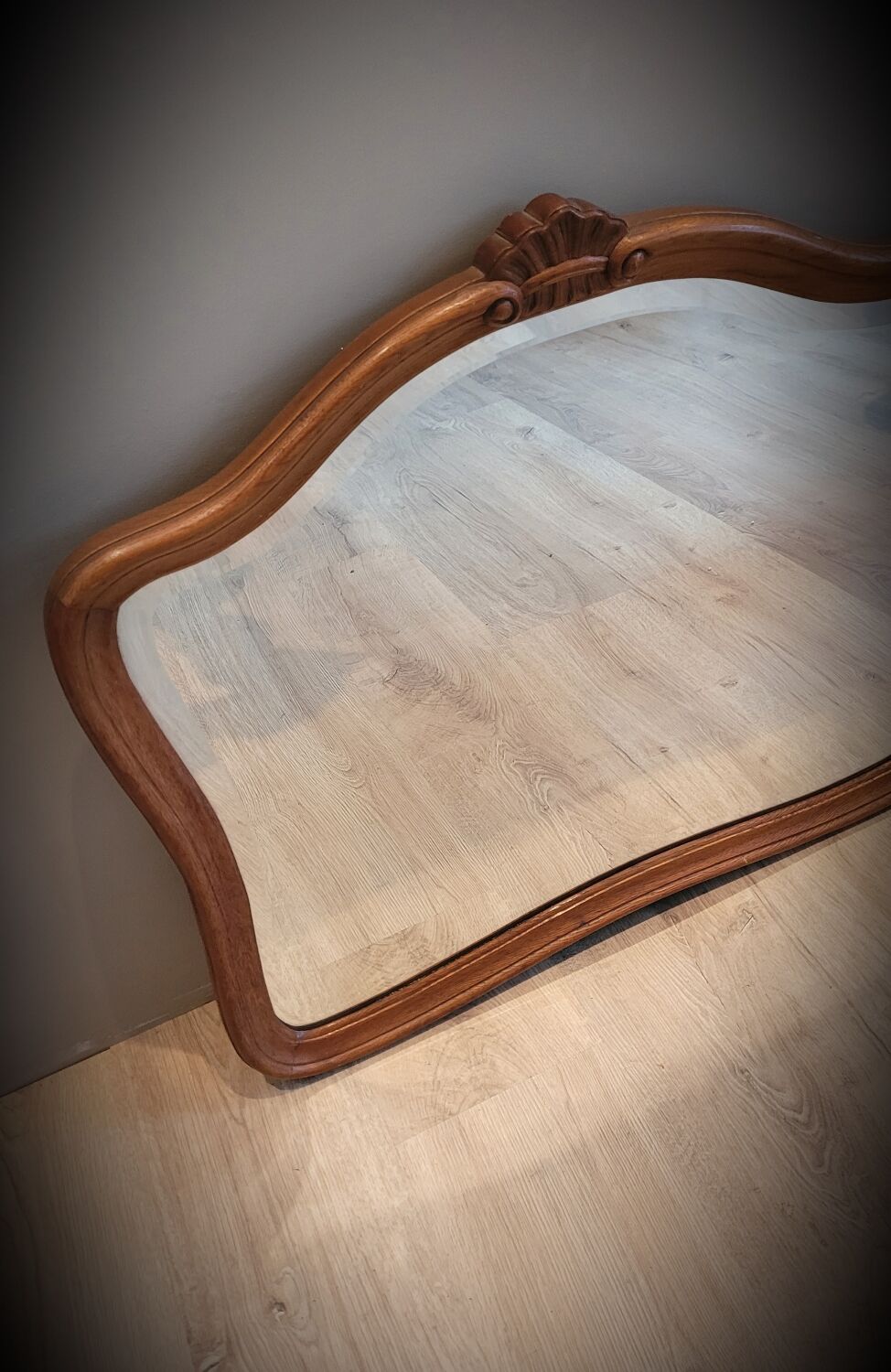 Elongated wooden mirror