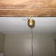 Suspension en bois et fils