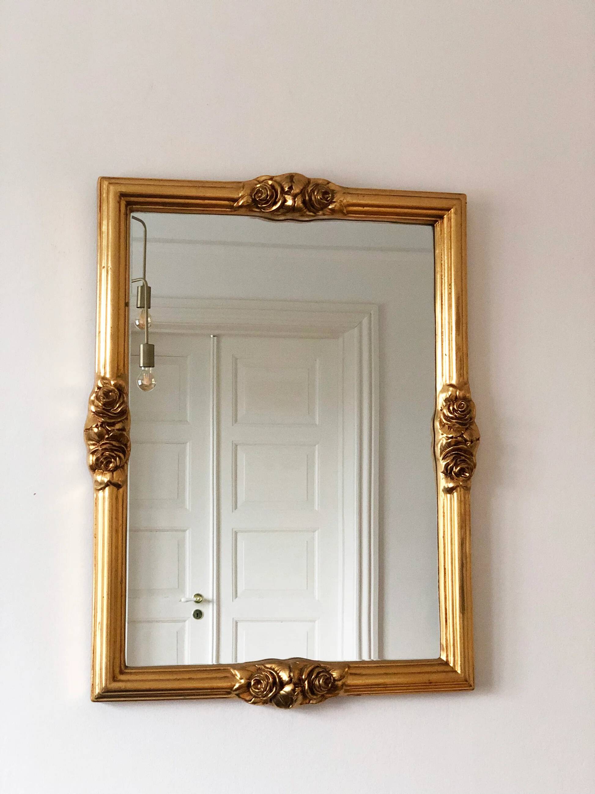 Vintage rectangular giltwood bevelled mirror with rose accents