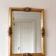 Vintage rectangular giltwood bevelled mirror with rose accents