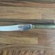 Set of 12 stainless steel knives with horn handles