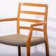 Fauteuils JL Moller modèle 68 en chêne avec tissu d'origine. Fabriqués au Danemark vers 1990.