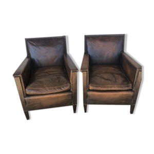 Paire fauteuils club en cuir vers 1930