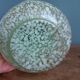 Green speckled glass vase from Clichy with gold threads.