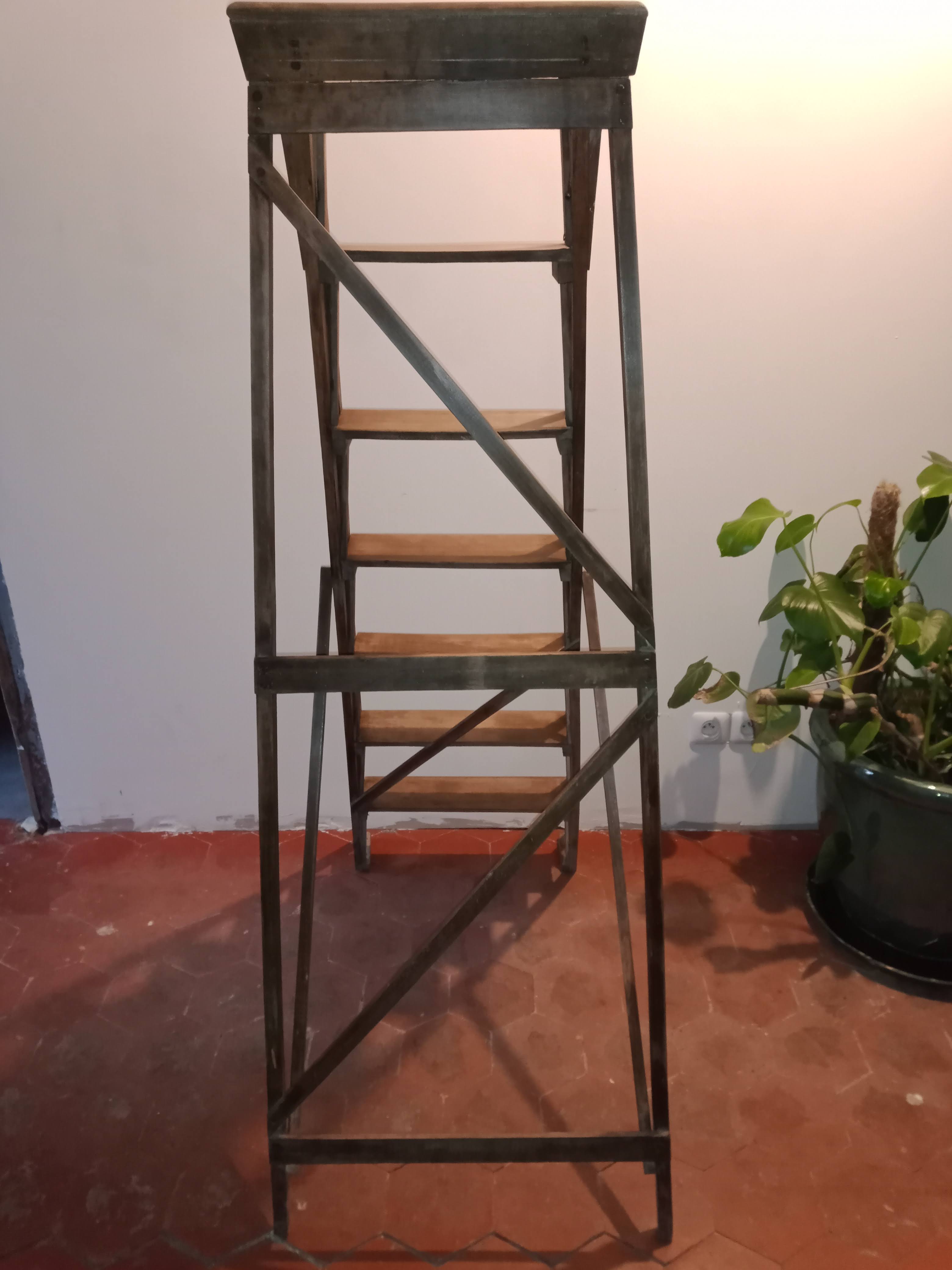 Old wooden stepladder six steps