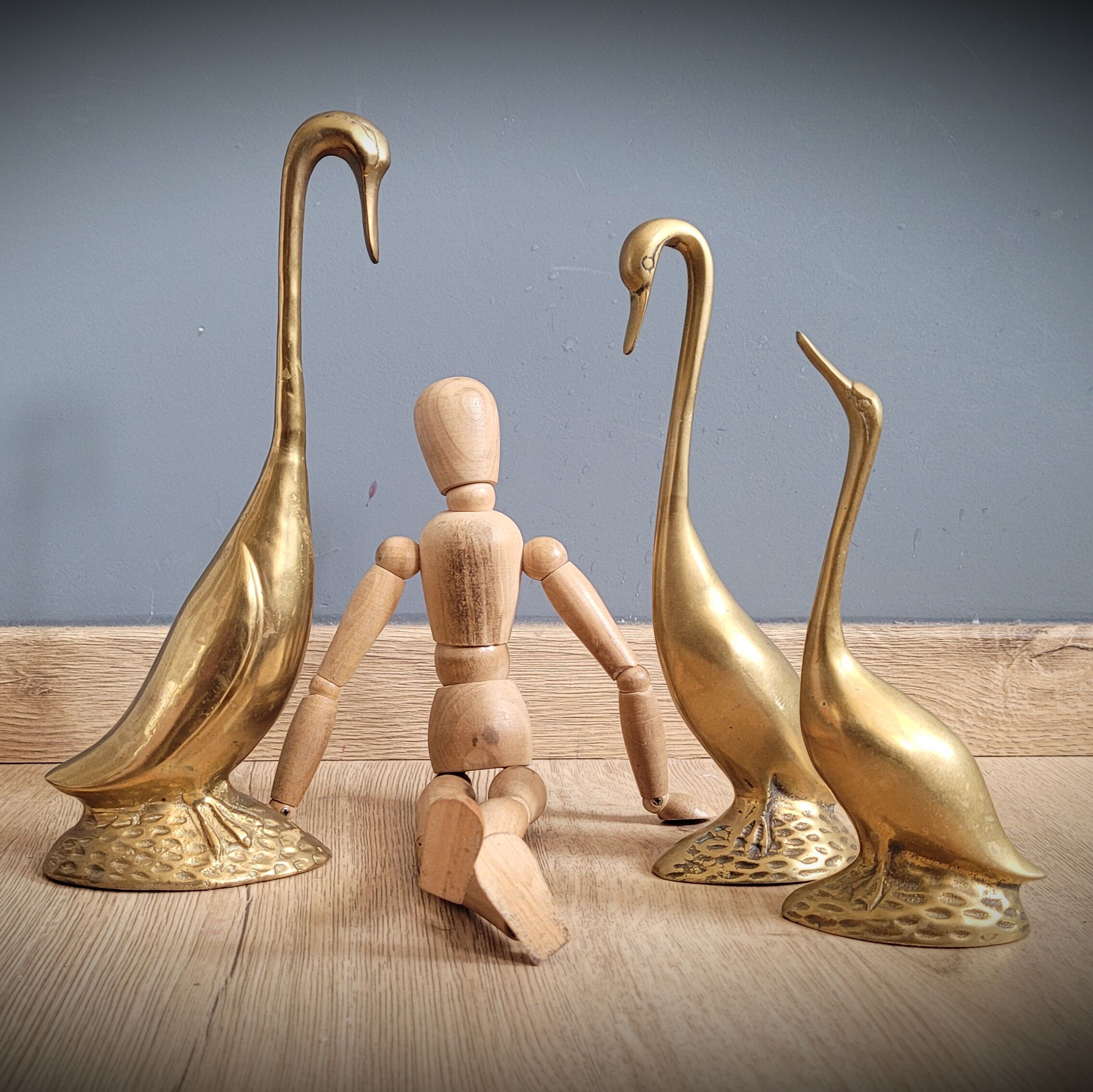 Trio of brass geese