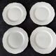 4 white Limoges porcelain dessert plates
