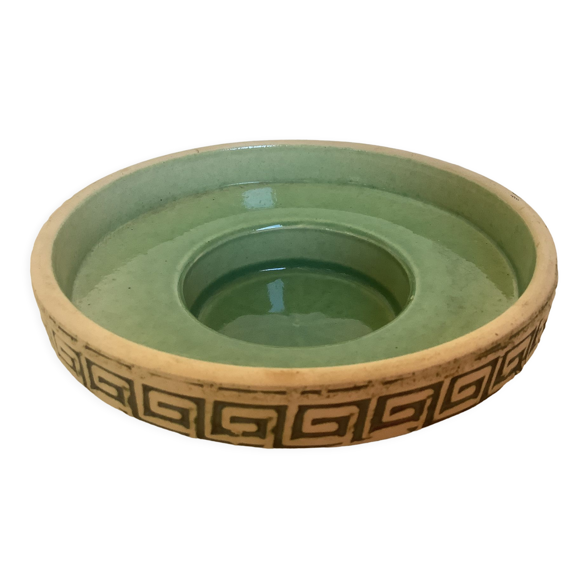 Green ceramic candle holder with a frieze