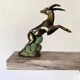 Art deco bookends in pink marble and spelters, antelopes