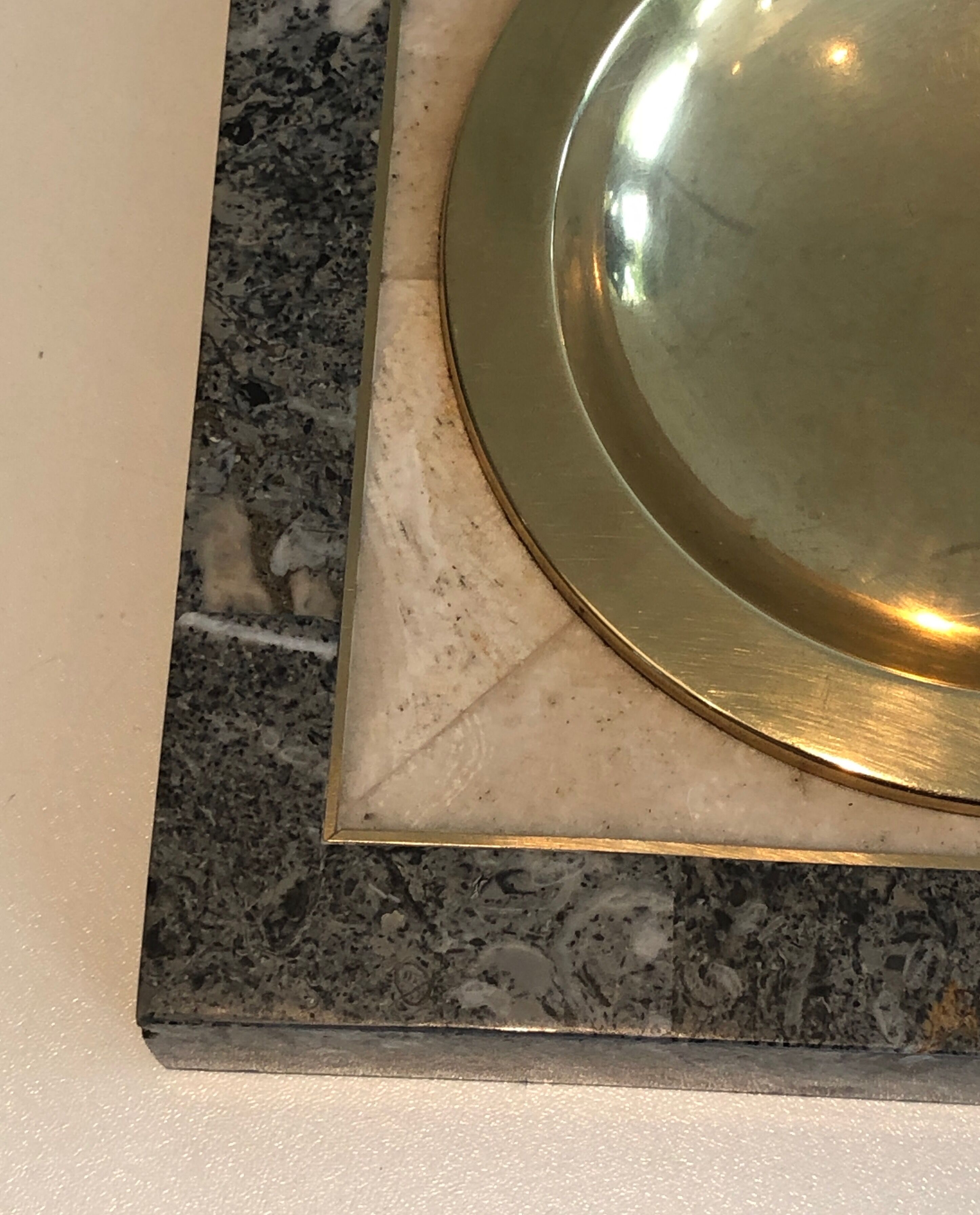 Neoclassical style pocket empty in faux-marble and brass. french work. around 1970