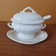 Mustard pot in the shape of a soup tureen made of porcelain.