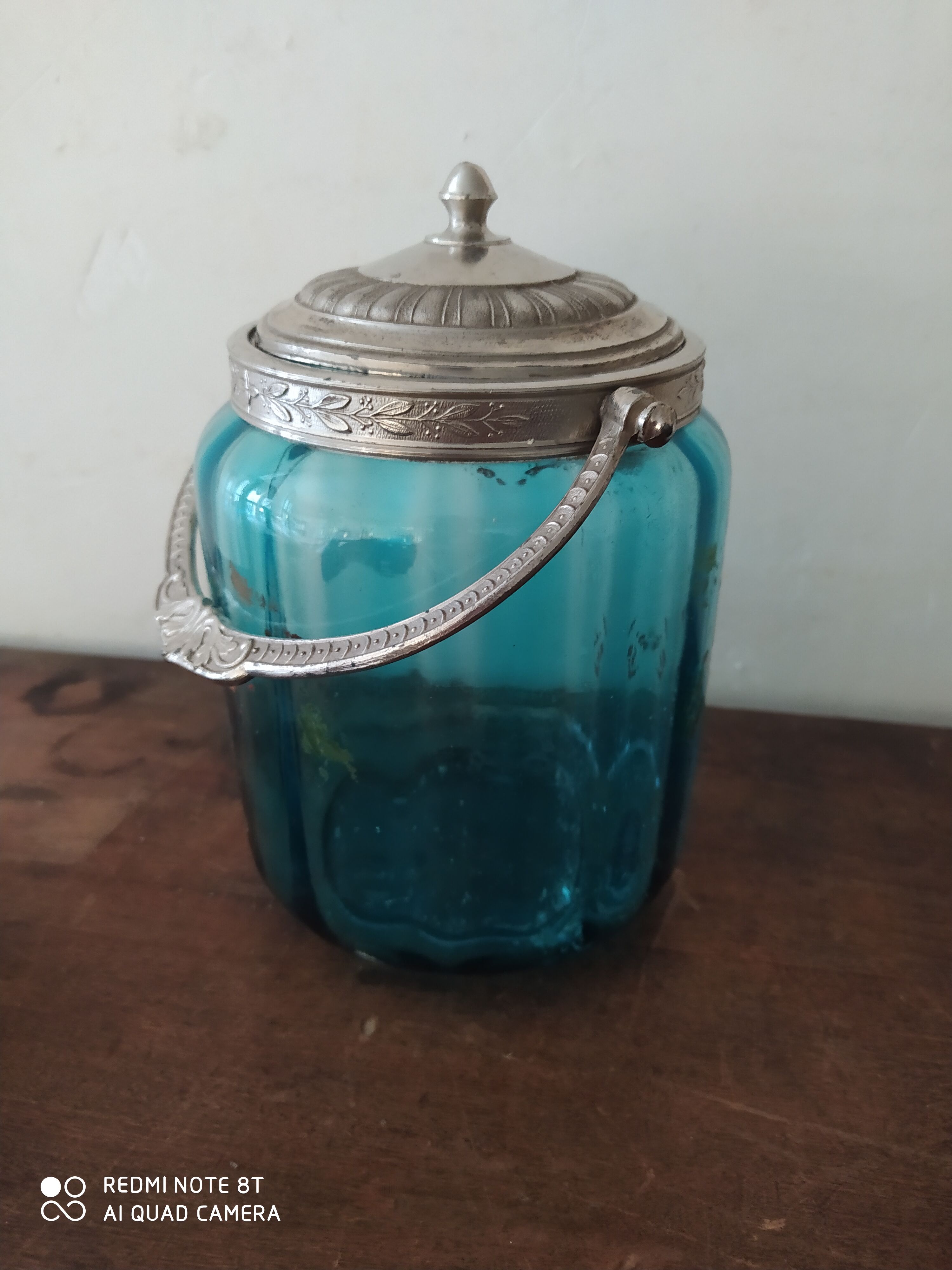 Set including a bottle and a turquoise blue glass jar