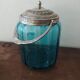 Set including a bottle and a turquoise blue glass jar