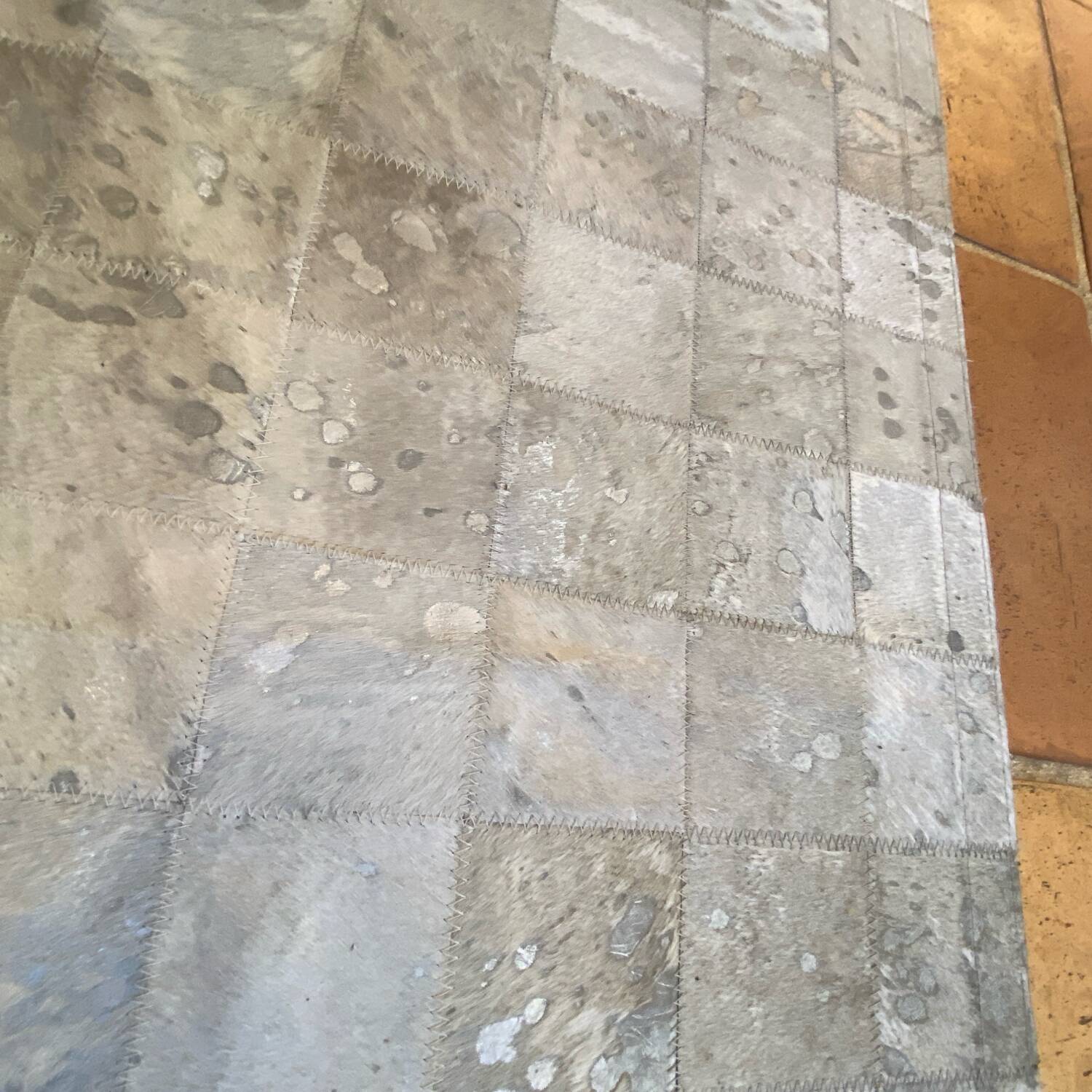 Cowhide rug, silver-grey patchwork