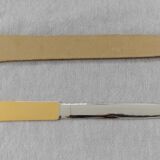 Metal paper cut in its case 1950