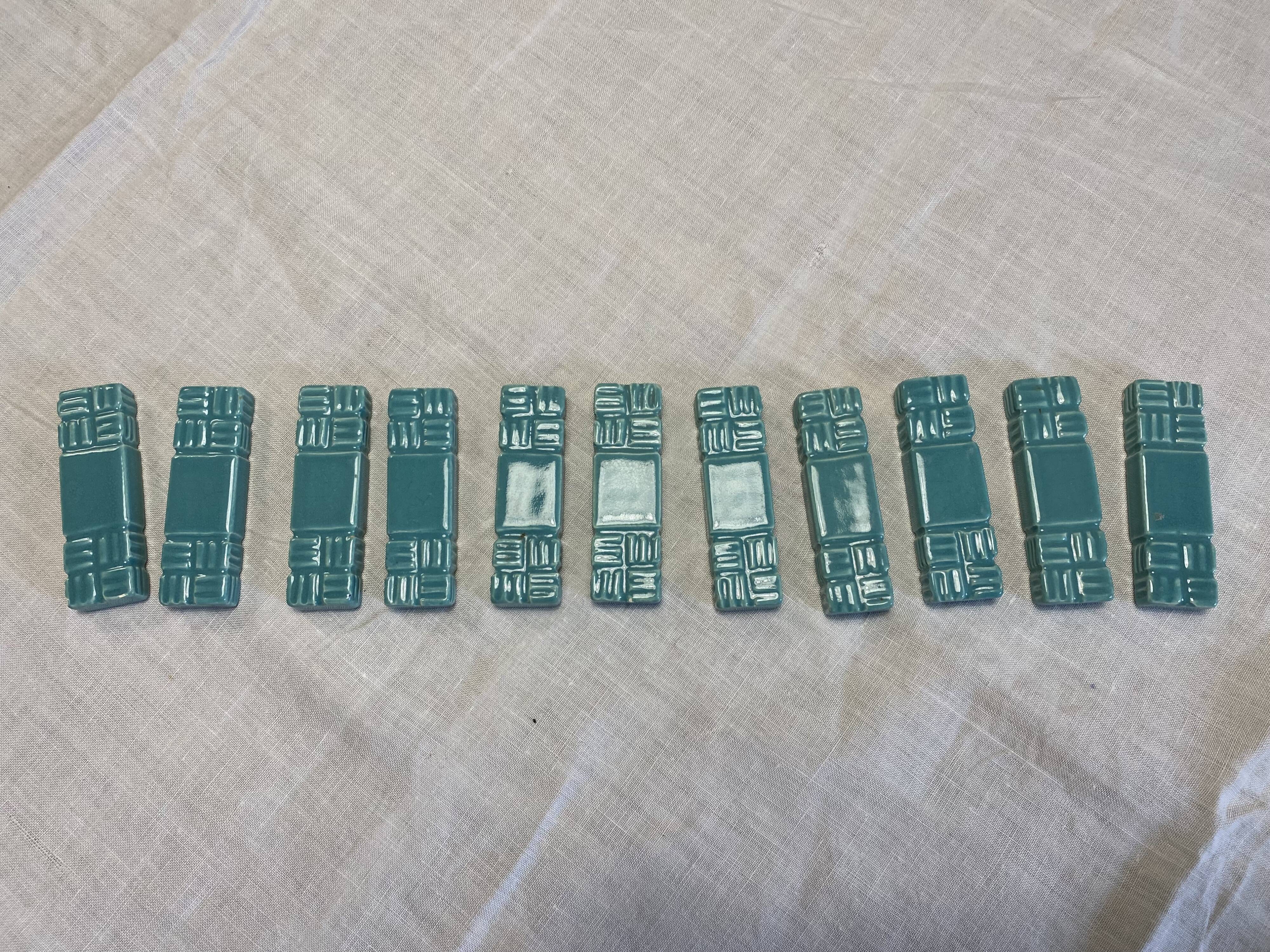 11 ceramic knife holders signed Jean Garillon