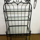Antique wrought iron shelf