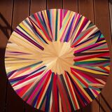 Round coffee table in straw marquetry