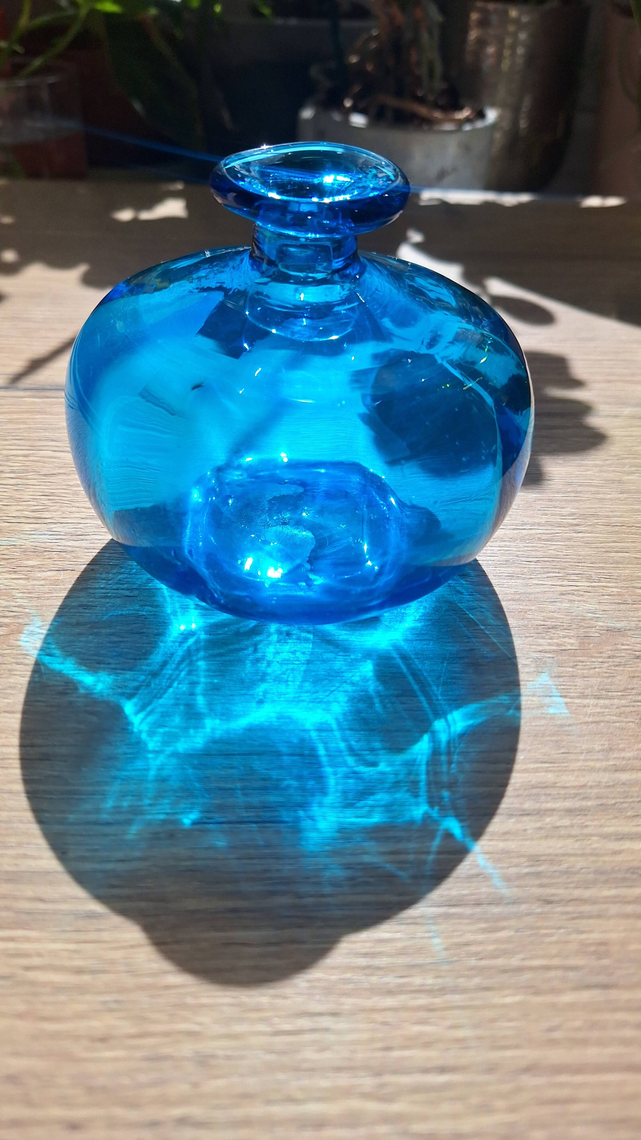 Turquoise blue blown glass vase