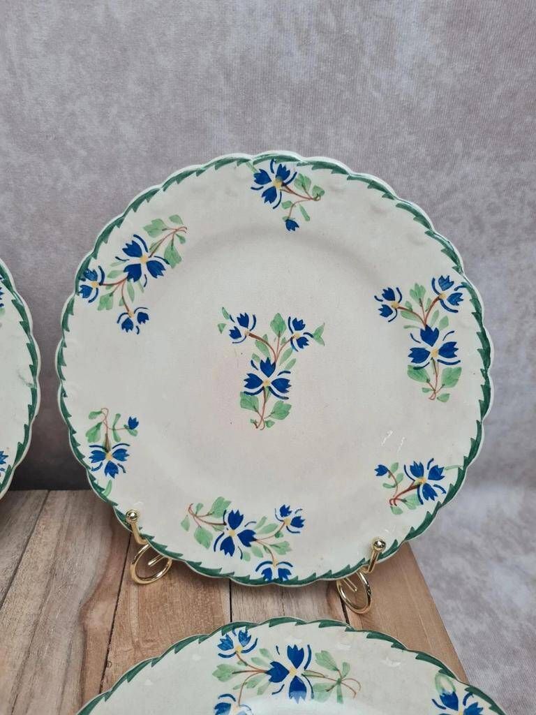 Set of 4 antique dessert plates in ironstone, with blue and green floral decoration.