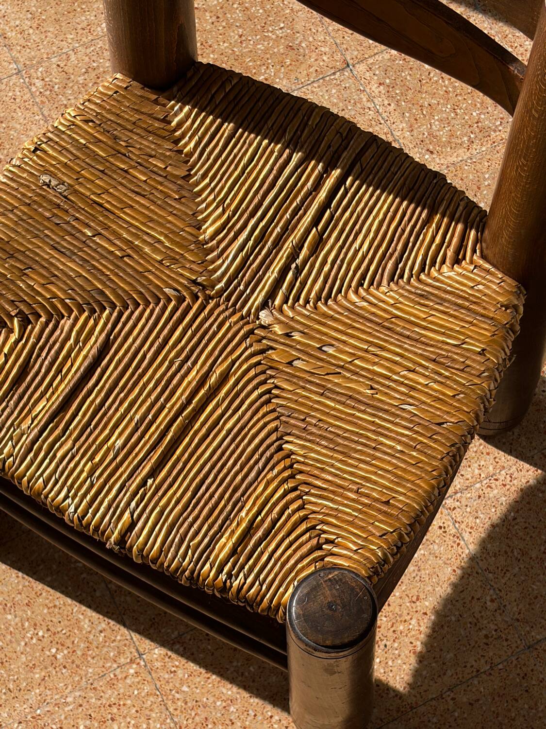 Low fireplace chair attributed to Charles Dudouyt.