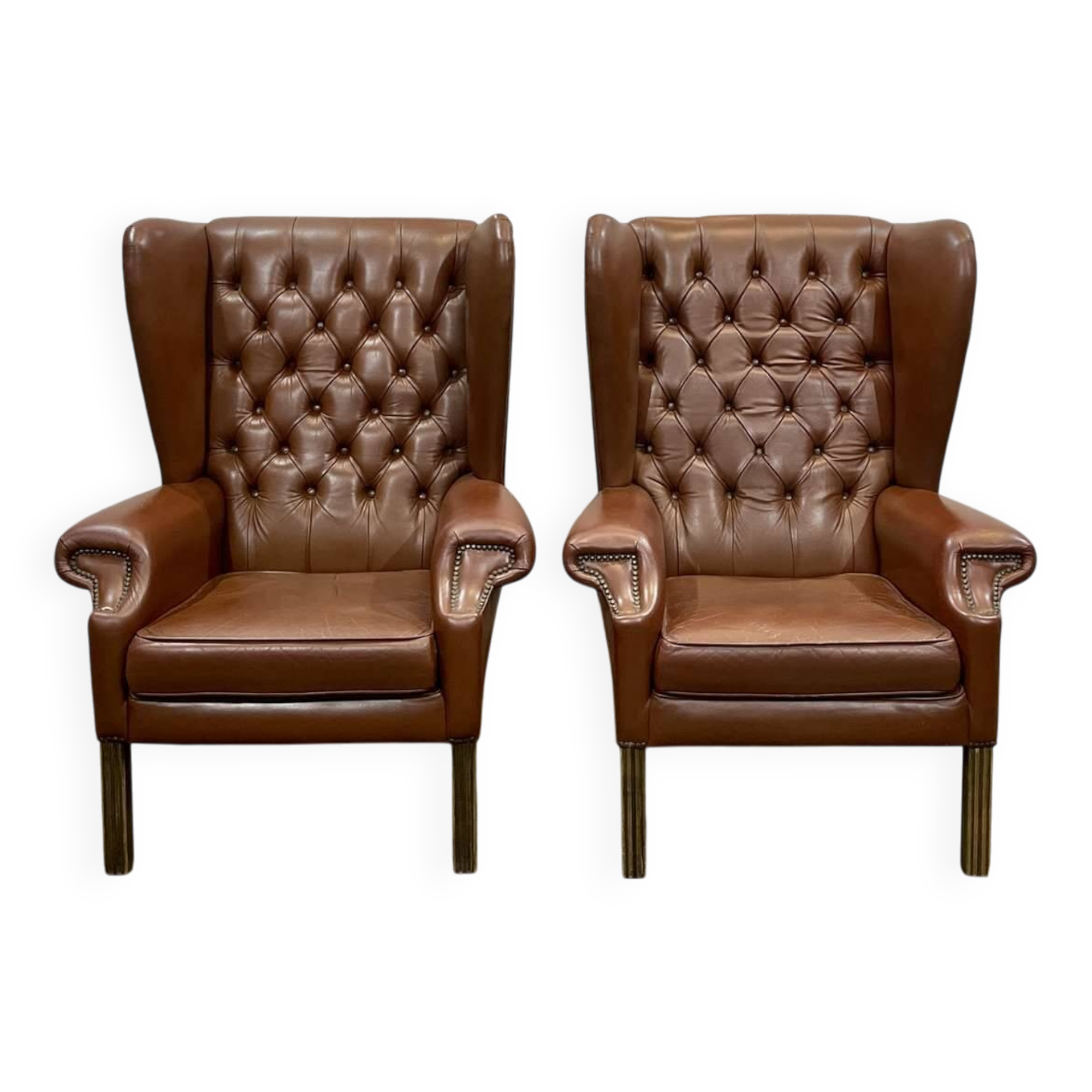 Pair of 1970s Chesterfield wingback chairs in brown leather