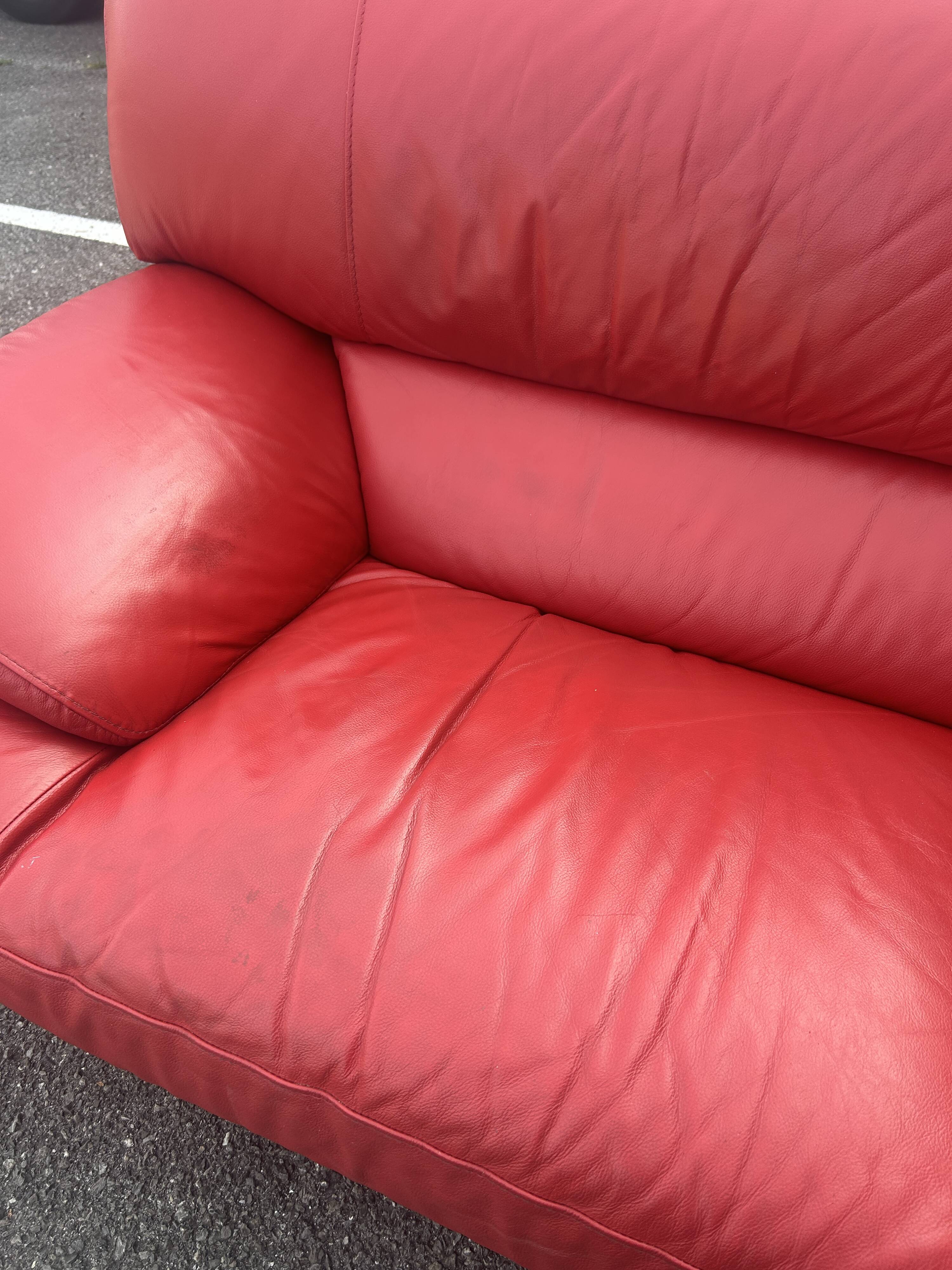 Three-seater red full-grain leather sofa – Vintage Italian design from the years.