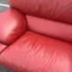 Three-seater red full-grain leather sofa – Vintage Italian design from the years.